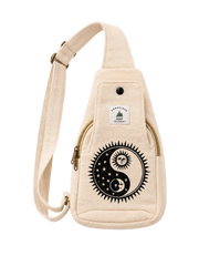 A beige canvas sling bag with a black yin-yang graphic on the front pocket, featuring a white 'Euphoric Design Co.' brand patch and gold-toned zipper accents, shown against a light off-white background.