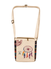 A canvas crossbody bag with a cream-colored body, a colorful dreamcatcher graphic, and patterned side panels, shown against a plain off-white background.