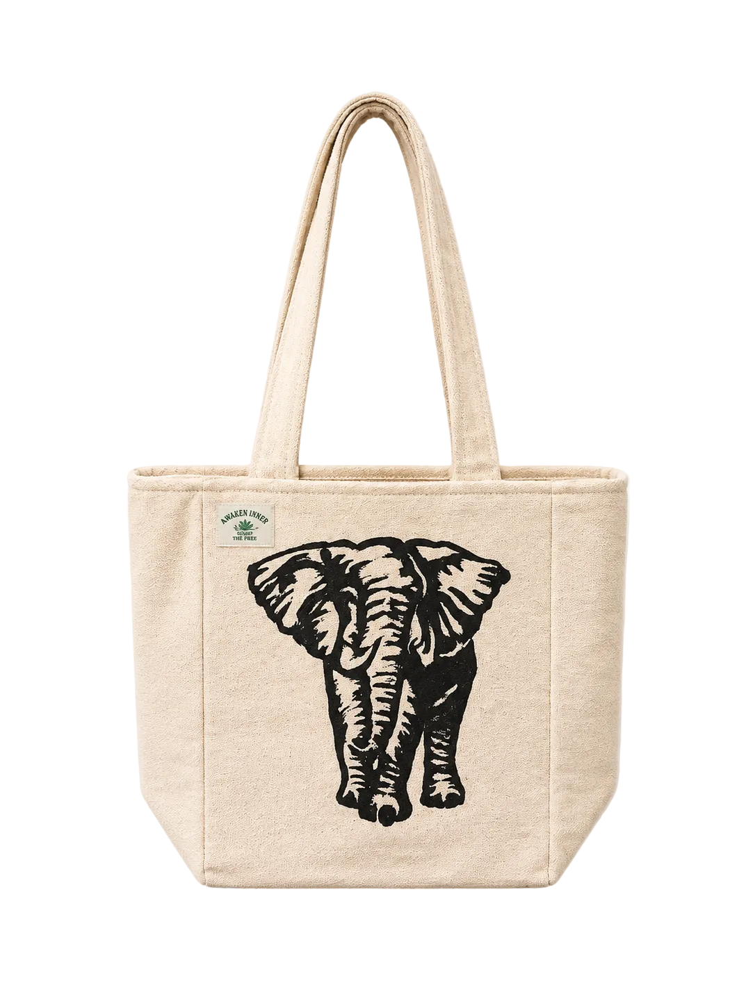 A natural canvas tote bag with a black elephant graphic print on the front and a small green circular brand tag on the upper left, shown against a plain off-white background.